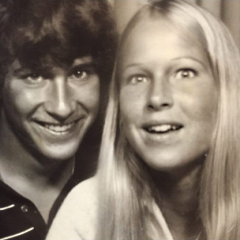 Black-and-white photo of a young Ed and Susan, cheek to cheek